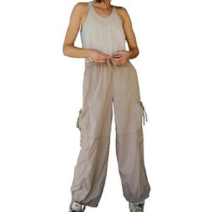 Free People FP Movement Back Packer Jumpsuit Muted Beige Size M New